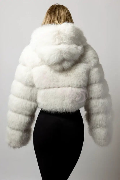 A blonde model wearing the SugarFur Frost White LED Coat from the back showing the hood laying flat
